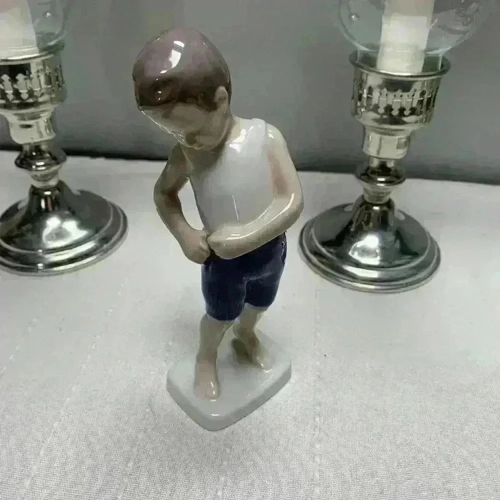 Bing & Grondhal 1948-1952 vintage boy fixing pants